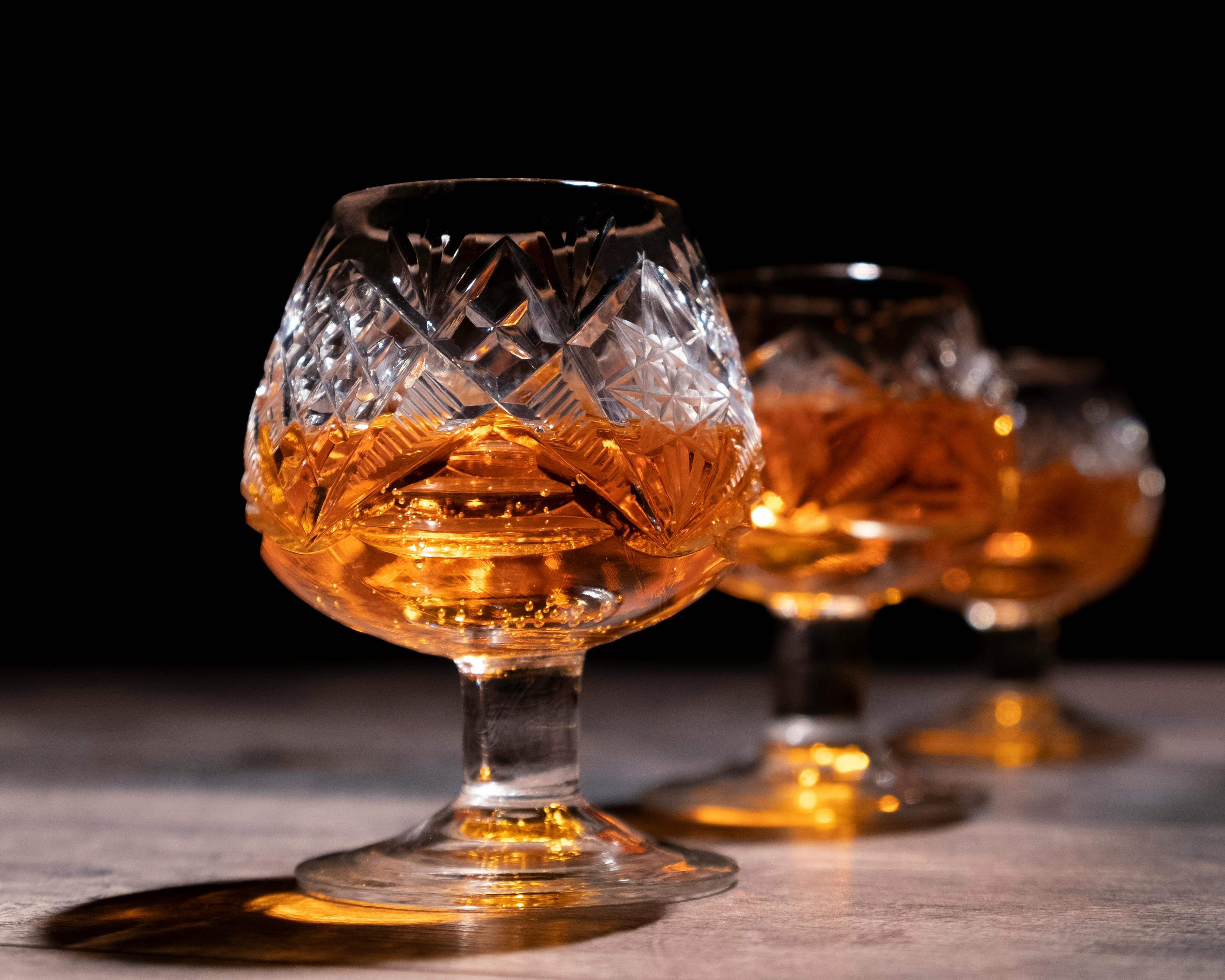 Wide bowl narrow rim glass with cognac